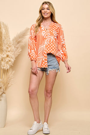 Casual orange color print button closure top