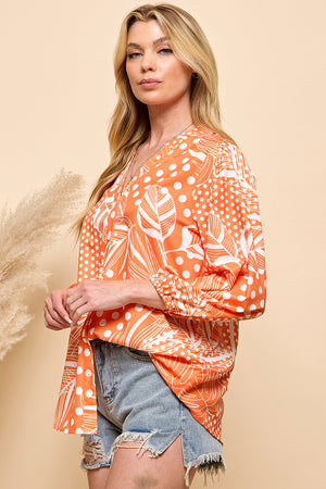 Casual orange color print button closure top