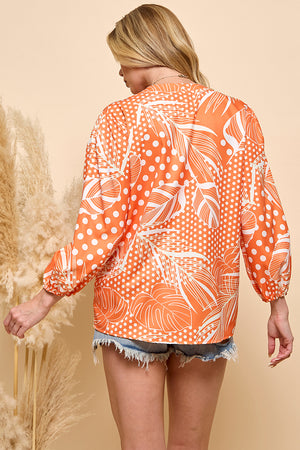 Casual orange color print button closure top